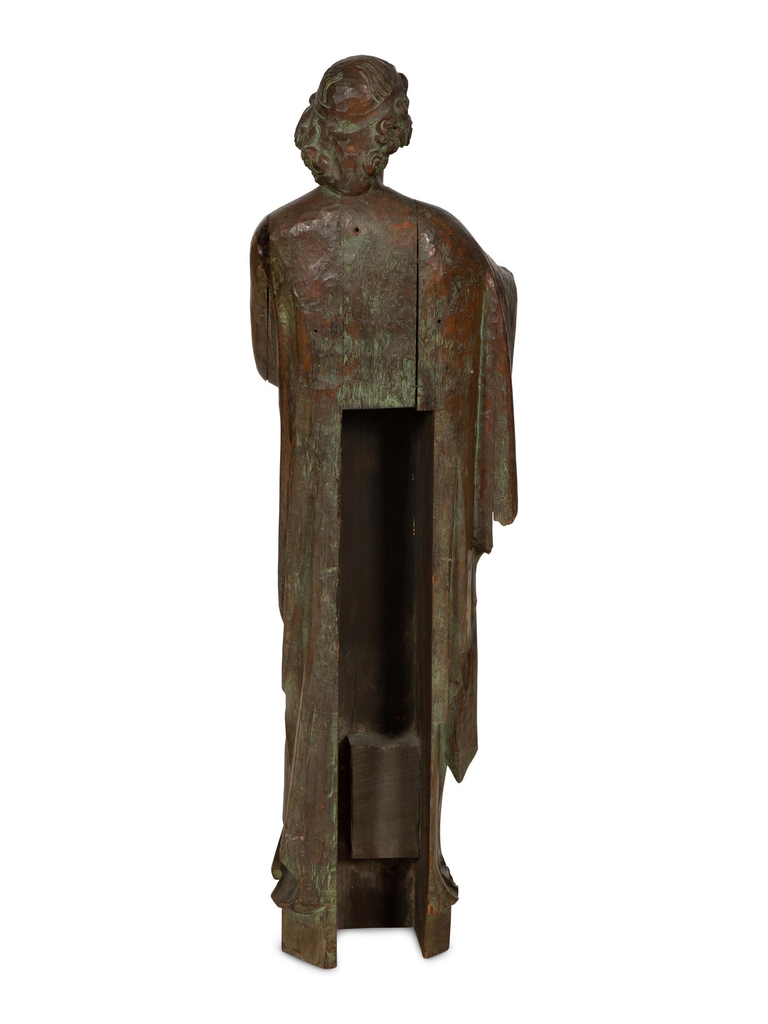 A Continental Carved Oak Figure of a Saint