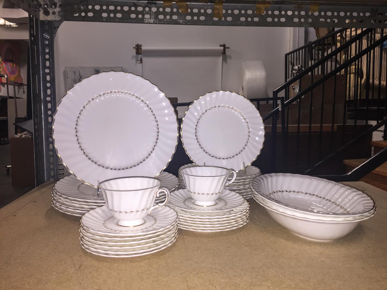 A Royal Doulton Partial Dinnerware Service Diameter of dinner plate 10 1/2 inches.