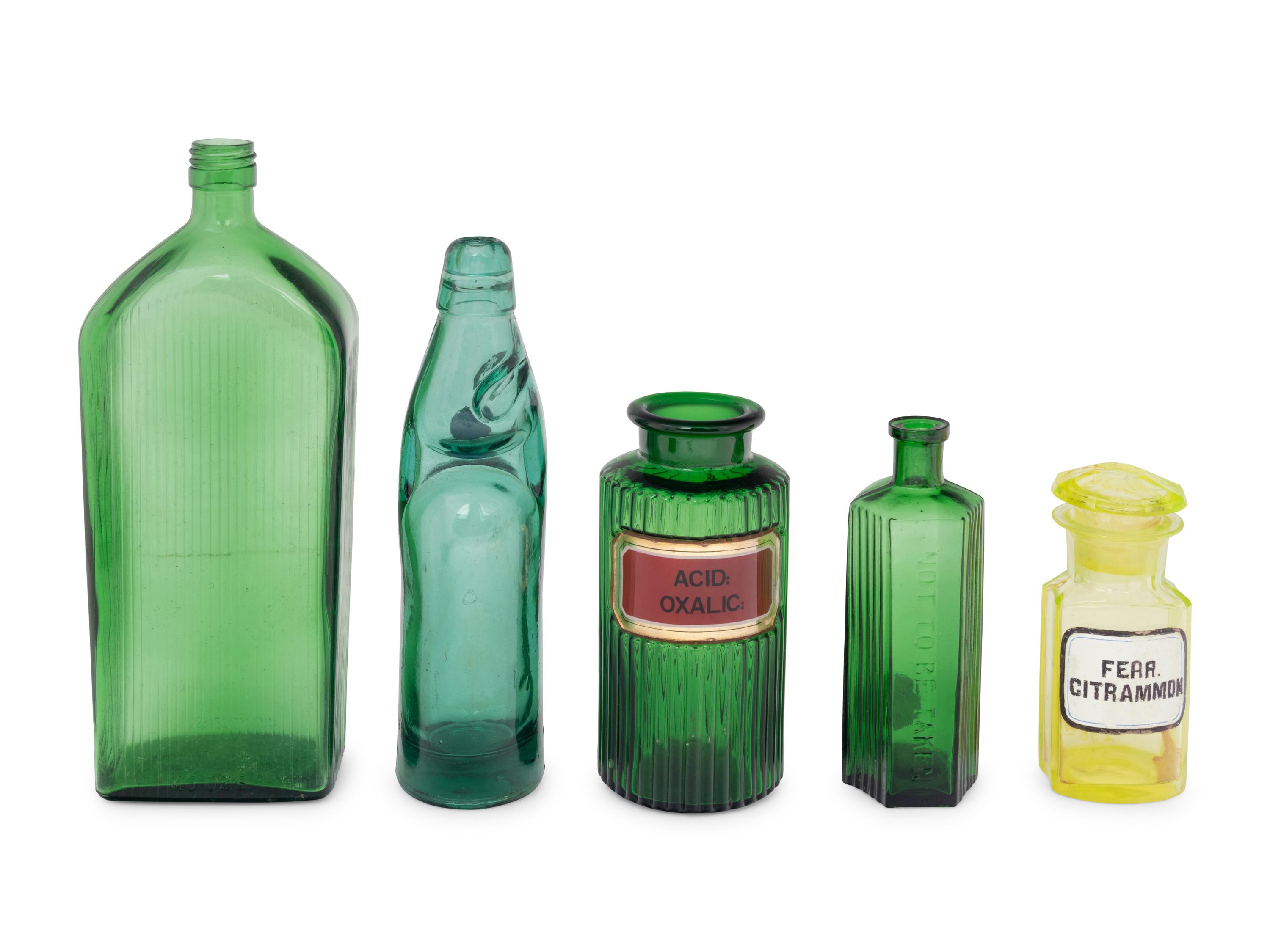 A Group of Green Glass Apothecary Bottles