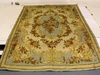 An Aubusson Style Hooked Tapestry 8 feet 9 inches x 5 feet 8 inches.