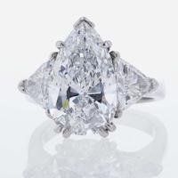Three-Stone Diamond and Platinum Ring 5.97 Carat Pear-Shape Diamond, GIA Certified