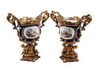 A Pair of Gilt Bronze Mounted Sèvres Style Porcelain Cache Pots
