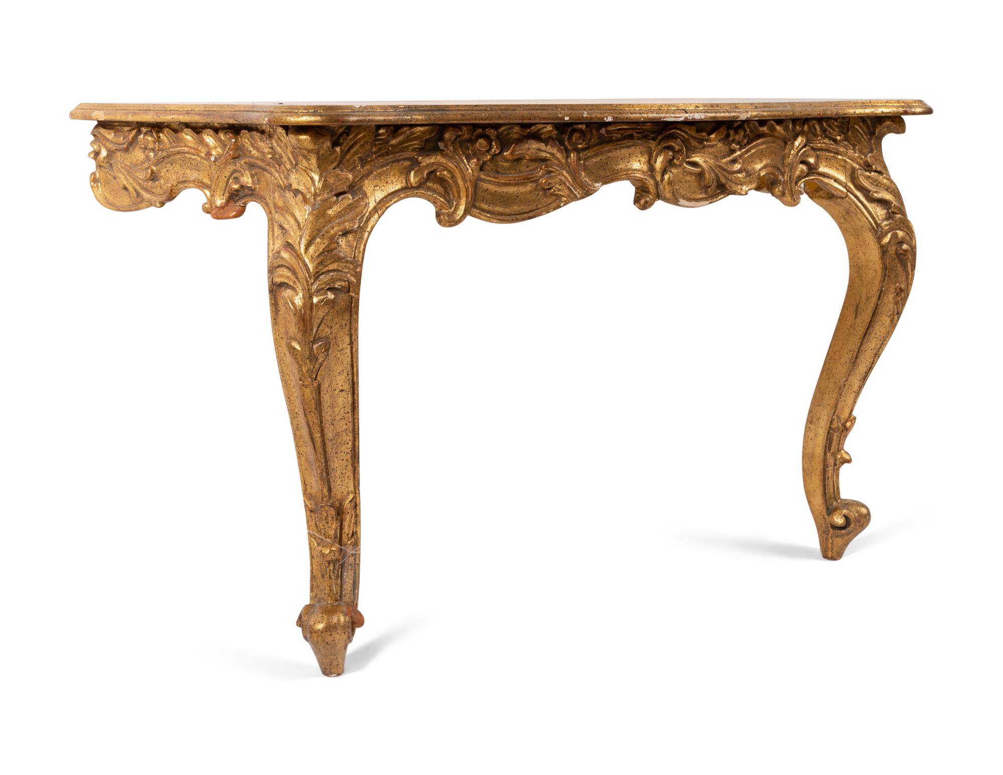 A Rococo Revival Giltwood Pier Mirror and Console Table