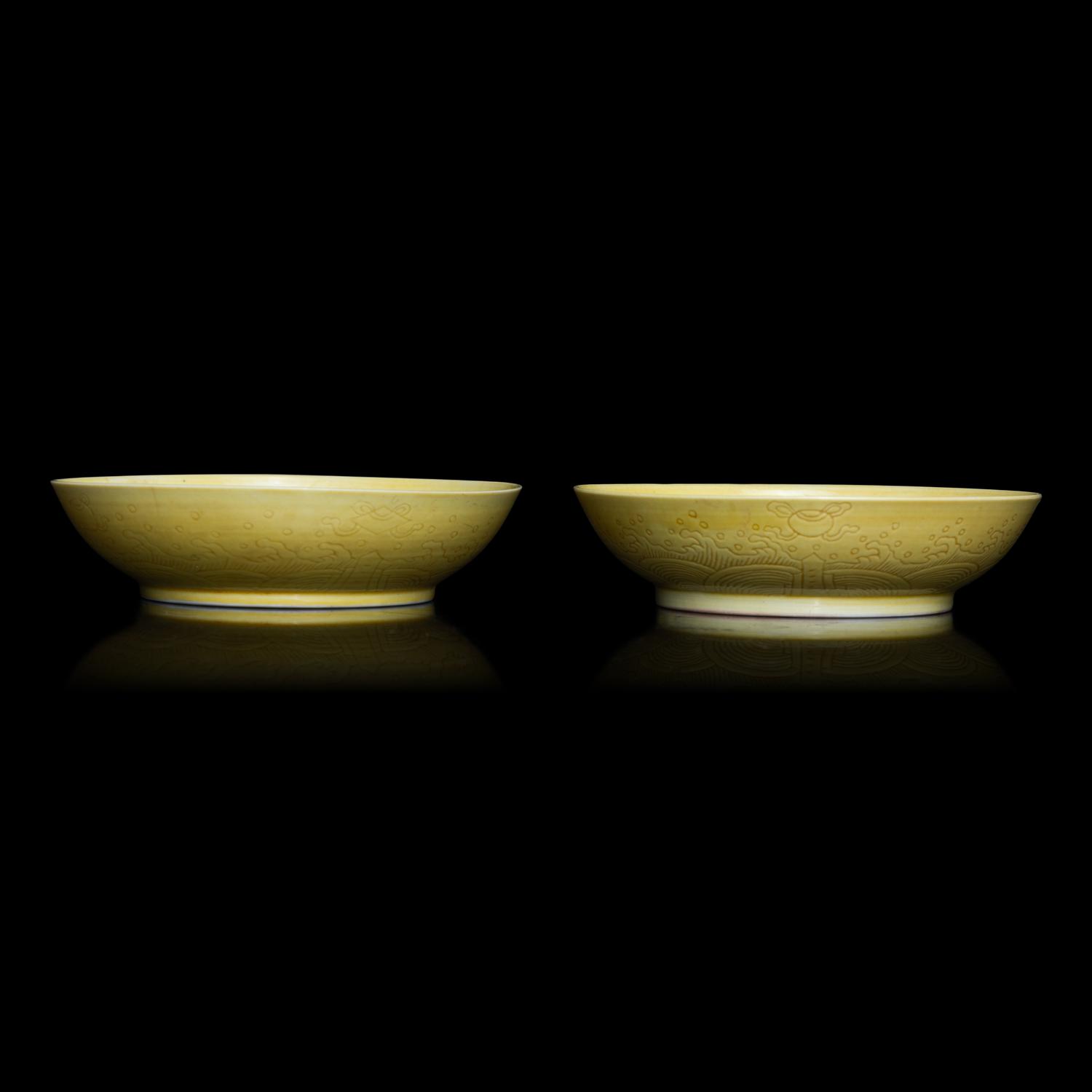 A Pair of Chinese Yellow Glazed Incised Porcelain 'Dragon' Dishes, Qianlong Marks and of the Period 清乾隆 嬌黃釉龍紋碟一對