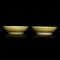 A Pair of Chinese Yellow Glazed Incised Porcelain 'Dragon' Dishes, Qianlong Marks and of the Period 清乾隆 嬌黃釉龍紋碟一對
