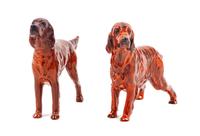 Two Porcelain Irish Setter Figures Width of wider 8 1/2 inches.