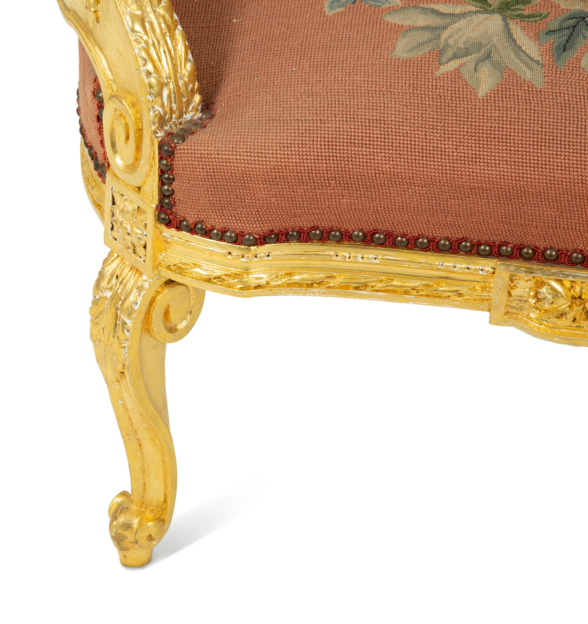 A Louis XVI Style Giltwood Bergere with Needlepoint Upholstery — 20TH CENTURY