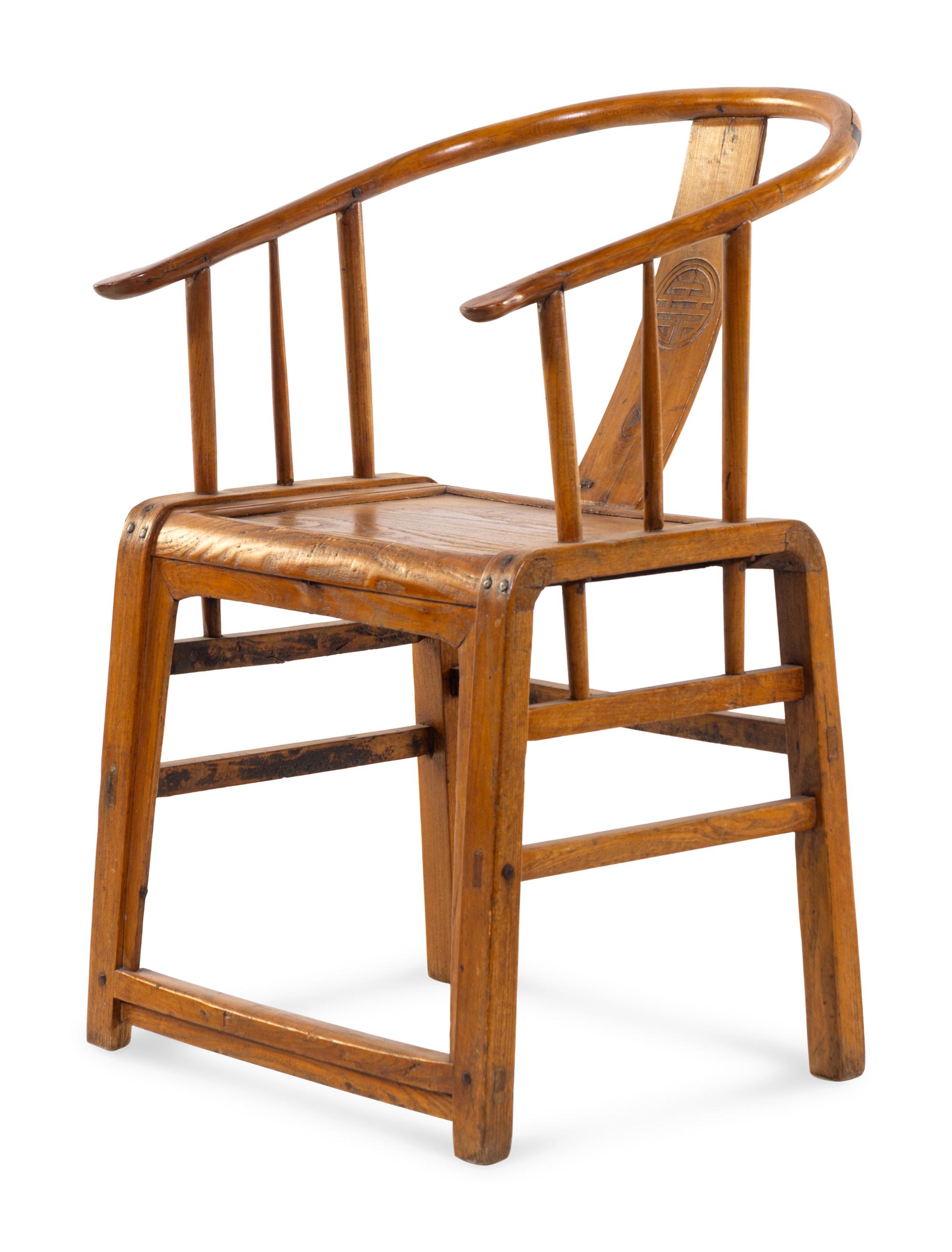 A Chinese Softwood Horseshoe-Back Armchair