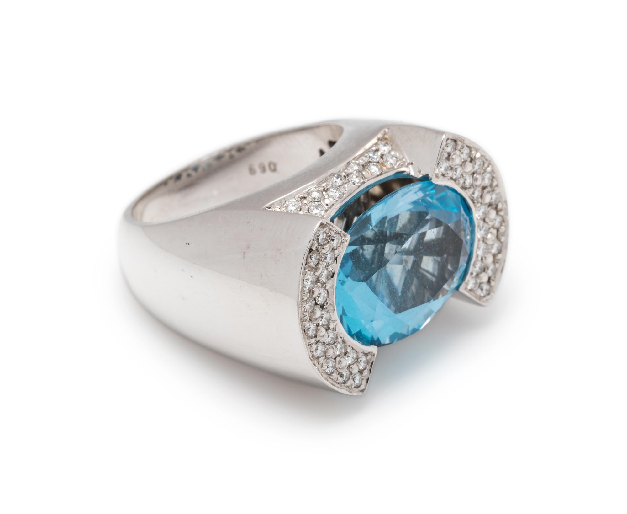 BLUE TOPAZ AND DIAMOND RING
