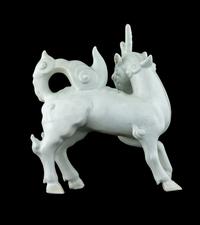 A Japanese White Glazed Porcelain Figure of Kirin