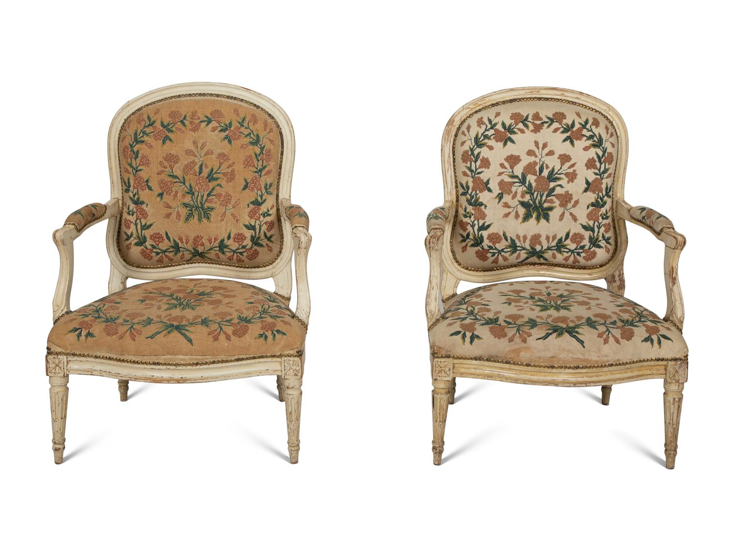 A Pair of Louis XVI Cream Painted Fauteuils