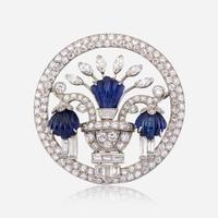 A diamond, carved sapphire, and platinum brooch, J. E. Caldwell & Co.