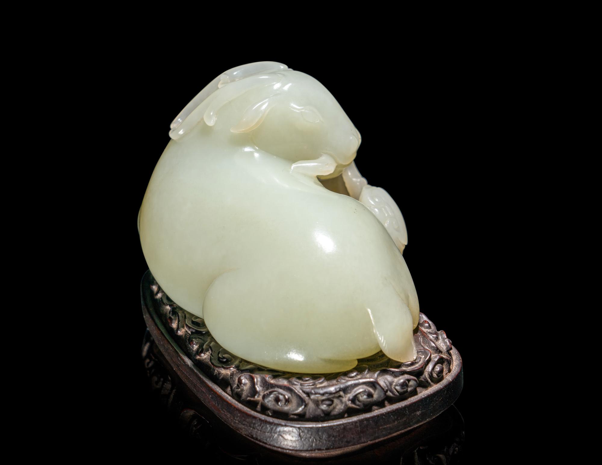 A Chinese Celadon Jade Figure of a Recumbent Ram