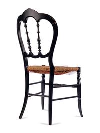 [LINCOLN ASSASSINATION]. An ebonized wooden chair purportedly used at Ford's Theatre during the performance of Our American Cousin , 14 April 1865.