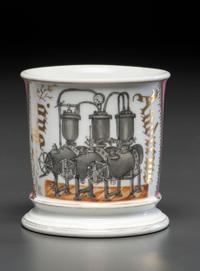 A Porcelain Shaving Mug Depicting A Steam Pump