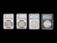 Four 1925 Peace $1 Coins