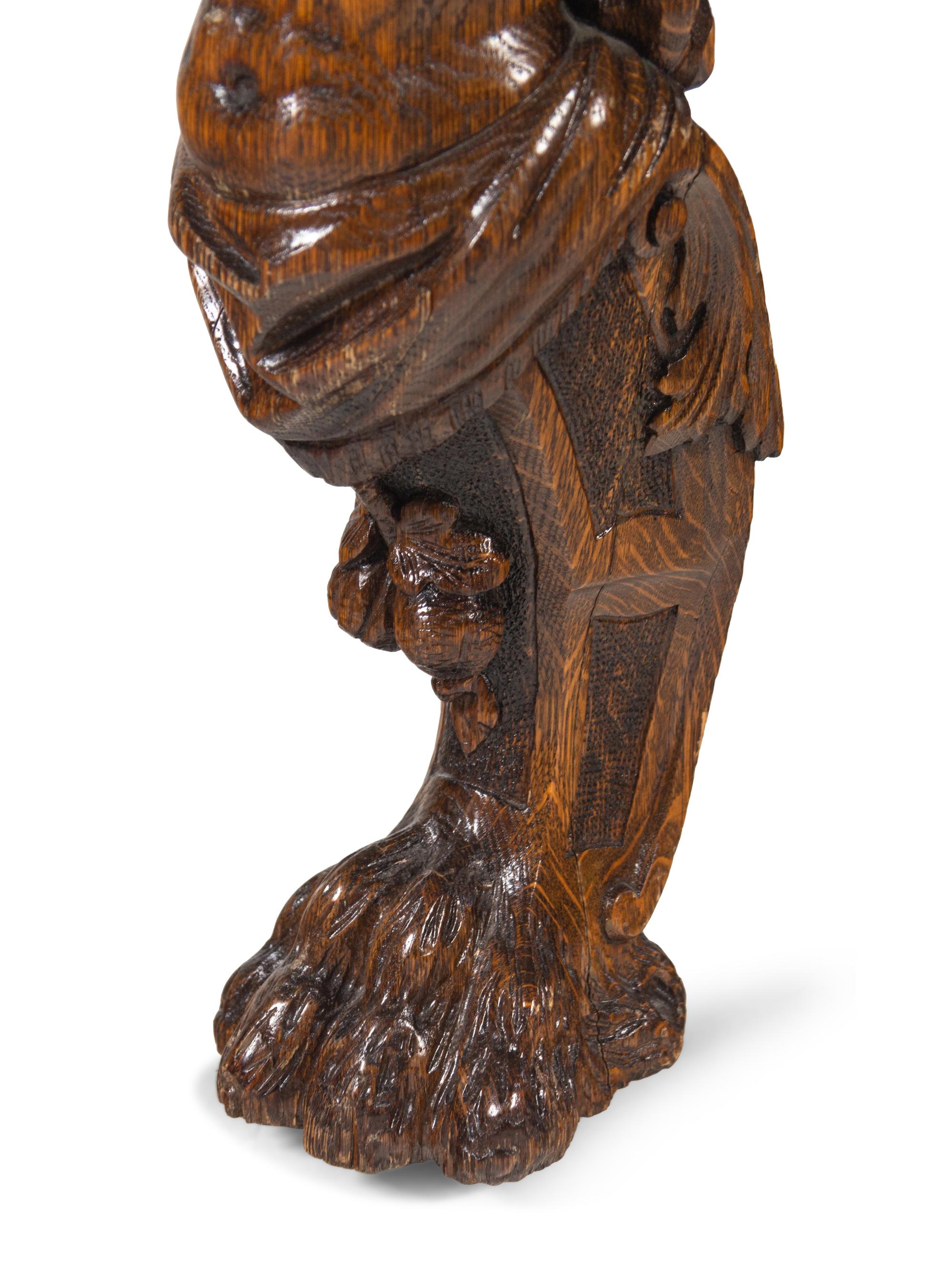 An R.J. Horner Carved Oak Man of the Mountain Dining Table