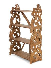 A Continental Carved Walnut Bookcase