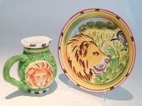 Two Handpainted Jungle Spree Pattern Ceramicware Height of jug 10 inches.