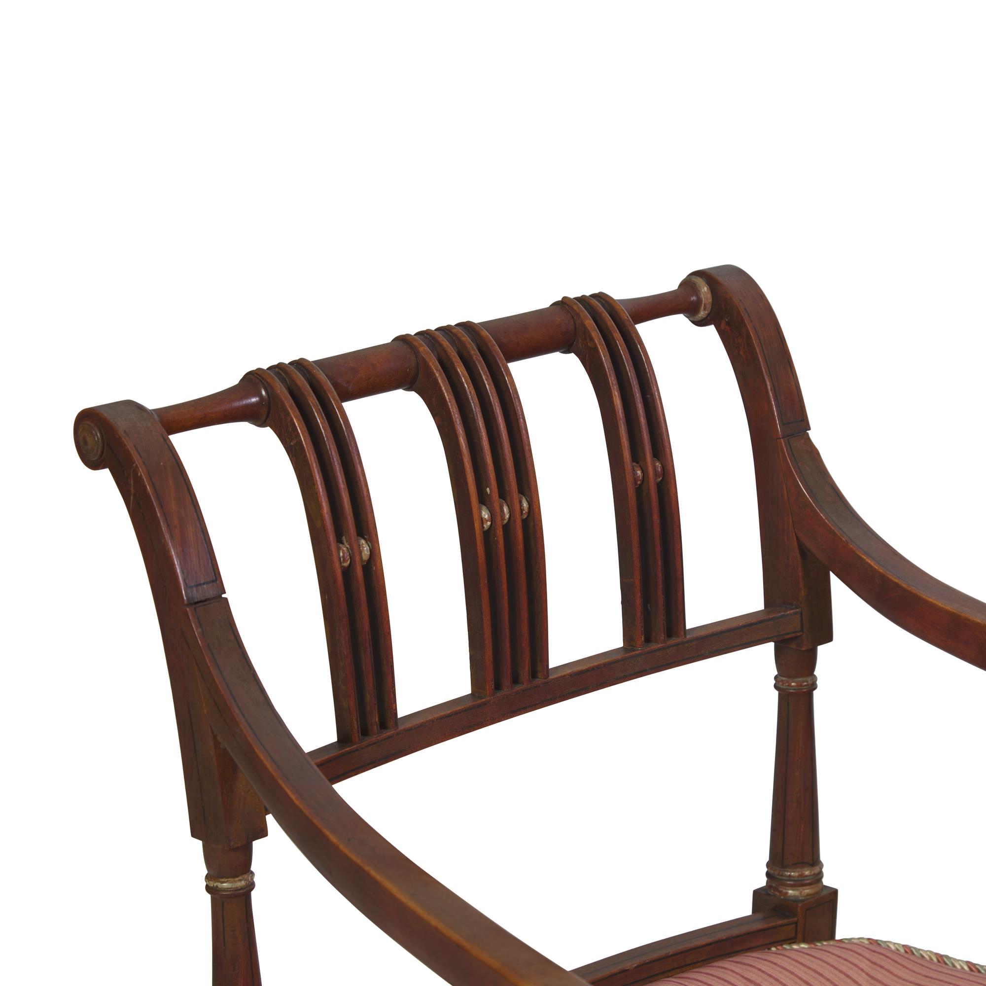 A Set of Four Regency Style Paint-Decorated Fruitwood Open Armchairs