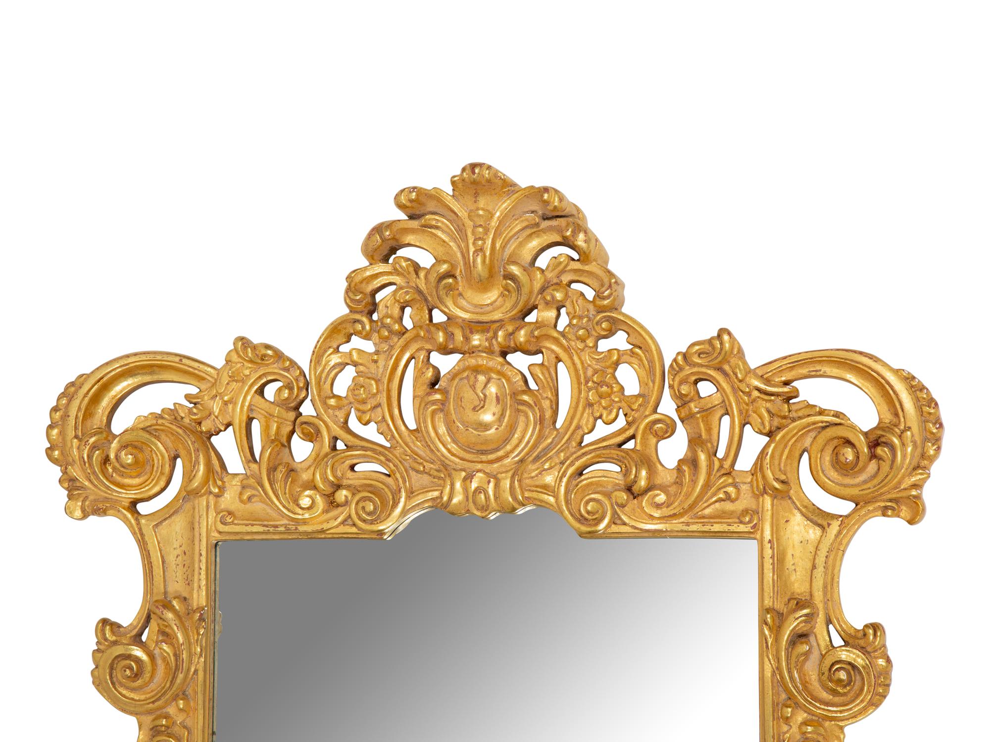A Pair of Italian Baroque Style Giltwood Mirrors