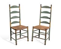 A Pair of Green-Painted and Decorated Ladder-Back Rush-Seat Side Chairs