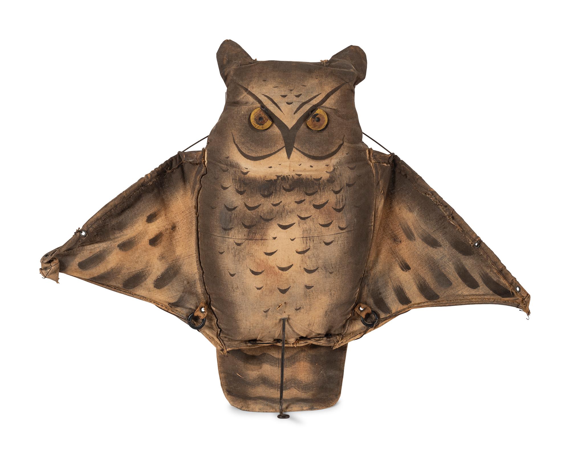A Stuffed Cloth Owl Decoy