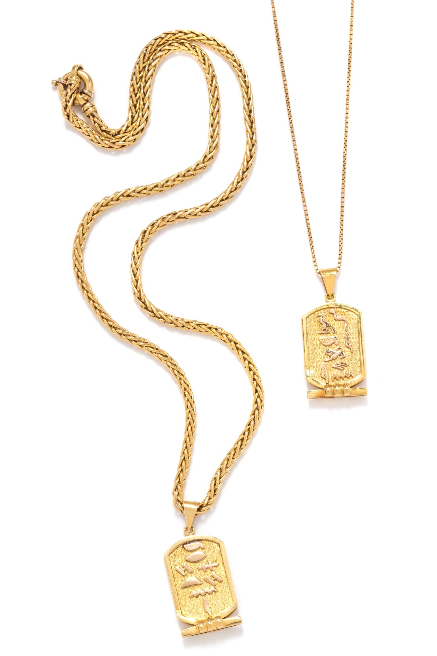 A Collection of Yellow Gold Egyptian Motif Pendant/Necklaces,