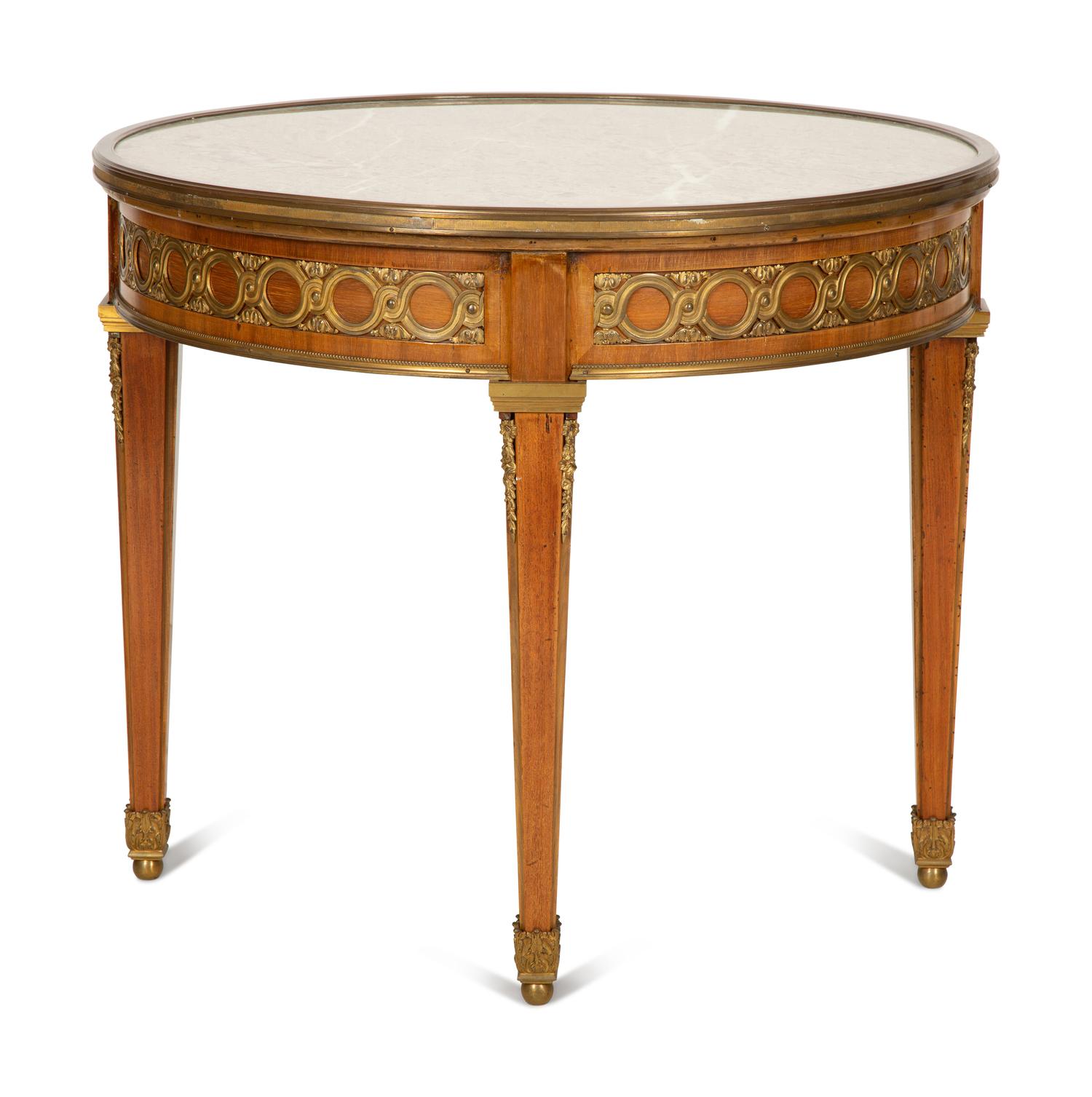 A Louis XVI Style Gilt Bronze Mounted Mahogany Marble-Top Guéridon