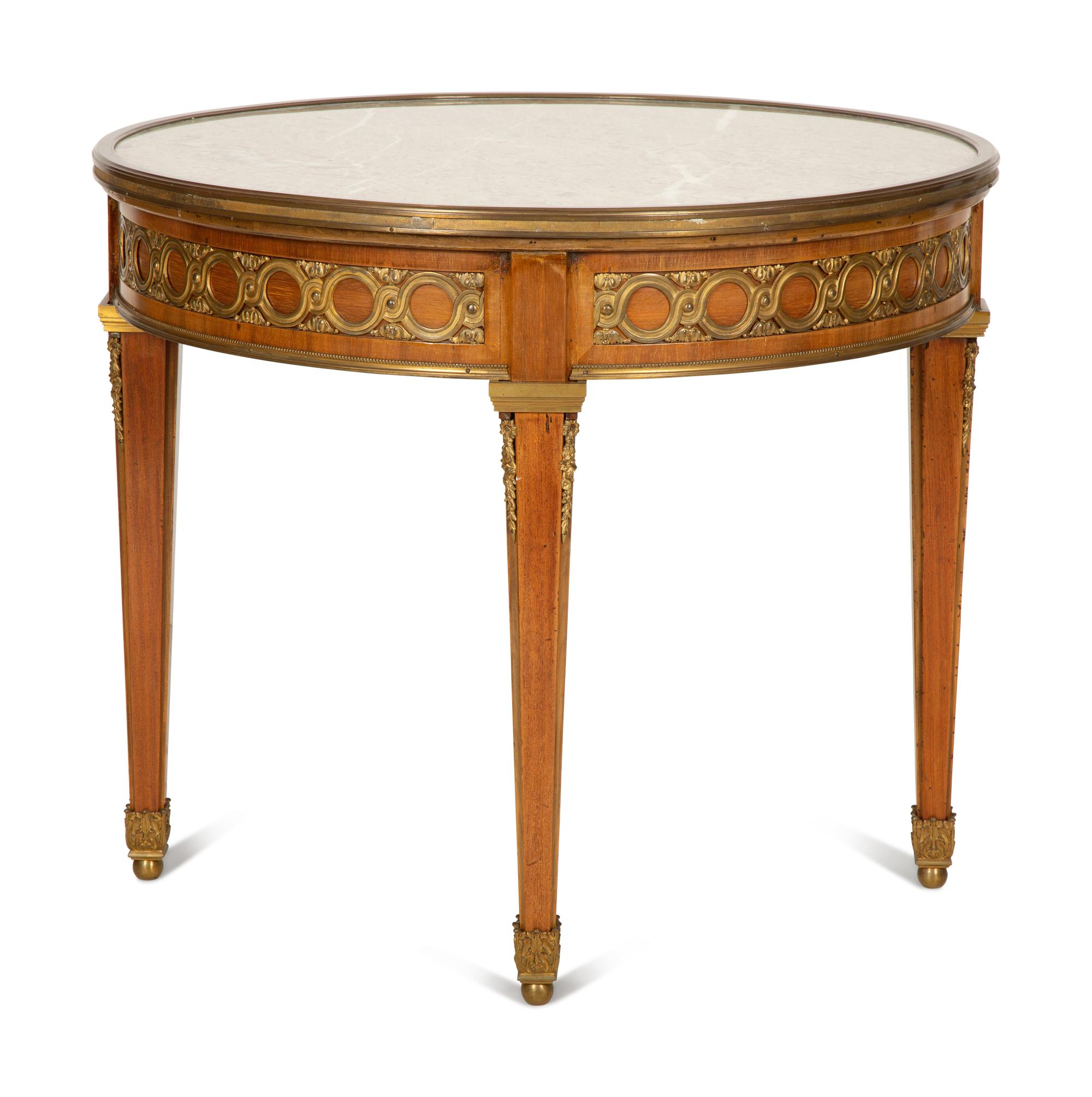 A Louis XVI Style Gilt Bronze Mounted Mahogany Marble-Top Guéridon