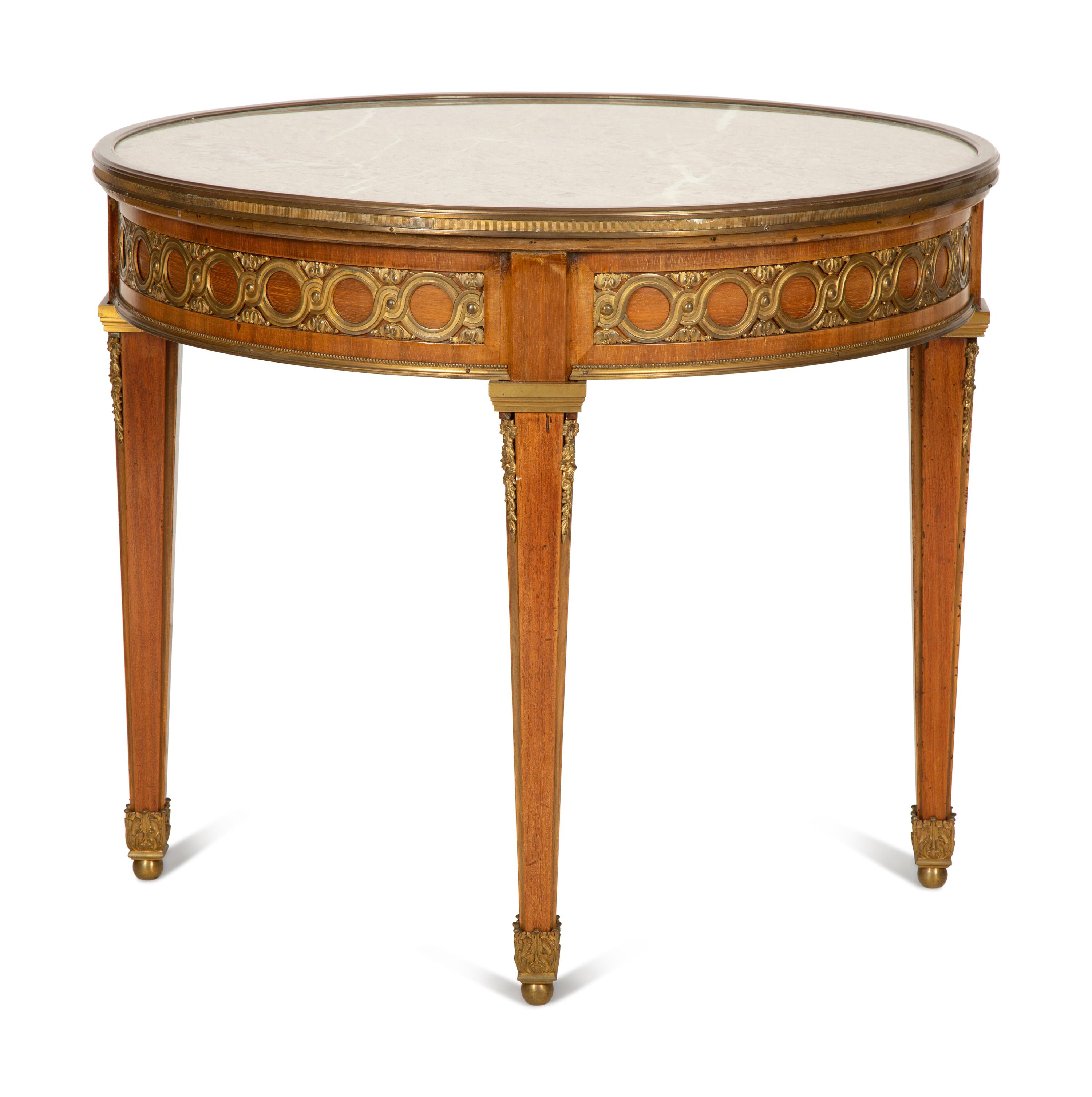 A Louis XVI Style Gilt Bronze Mounted Mahogany Marble-Top Guéridon