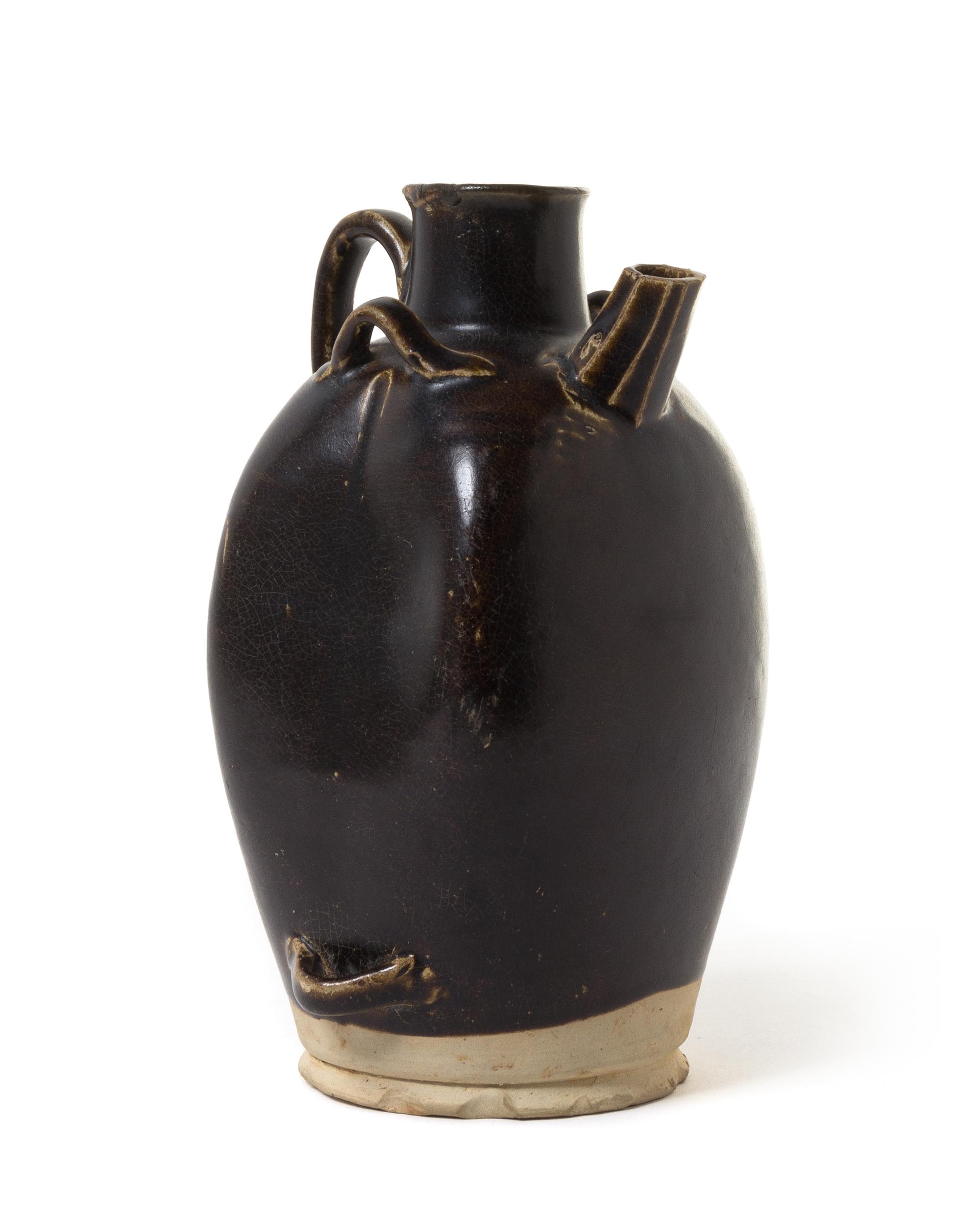 A Black Glazed Pottery Ewer — LIKELY TANG DYNASTY