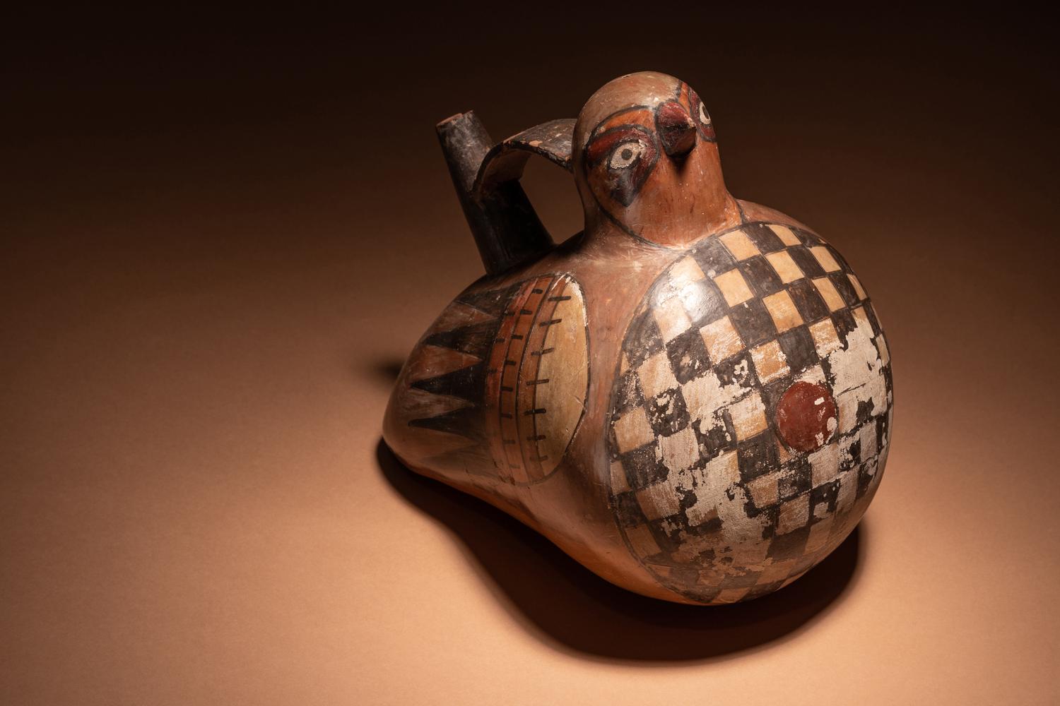 A Nazca Polychrome Terracotta Bird Stirrup Vessel