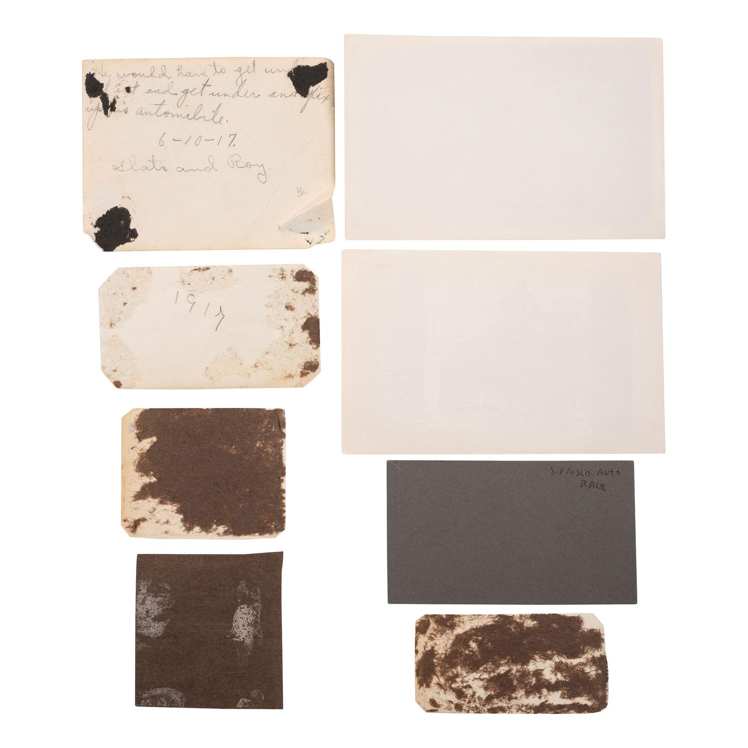 [EARLY PHOTOGRAPHY] --[AUTOMOBILES]. A group of photographs of early automobiles, mechanics and auto shops, including racing action shots, comprising: