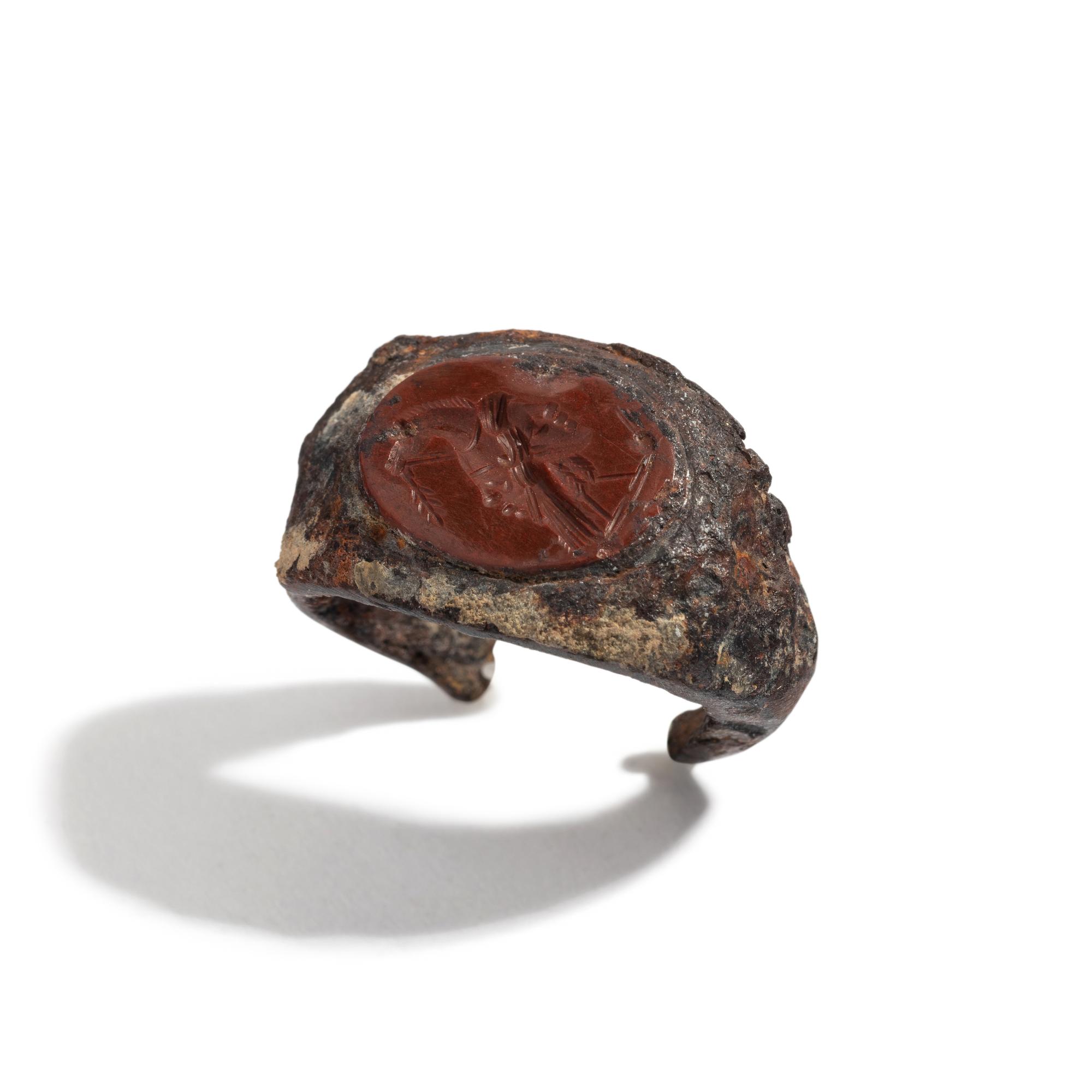 A Roman Iron and Red Jasper Finger Ring with a Gryllos (Composite Figure)