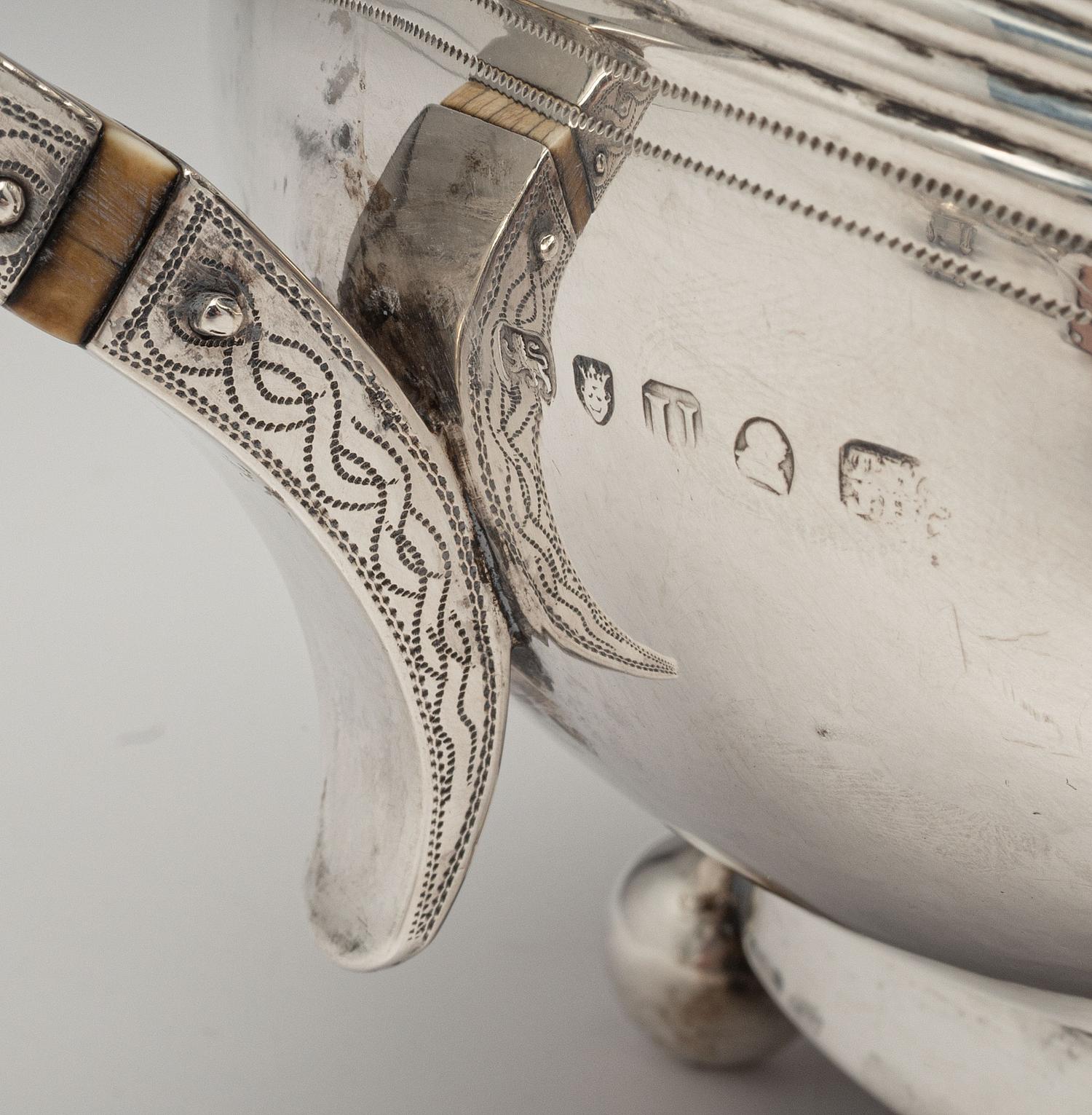 An English Silver Four-Piece Coffee and Tea Service