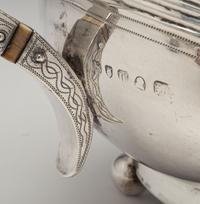 An English Silver Four-Piece Coffee and Tea Service