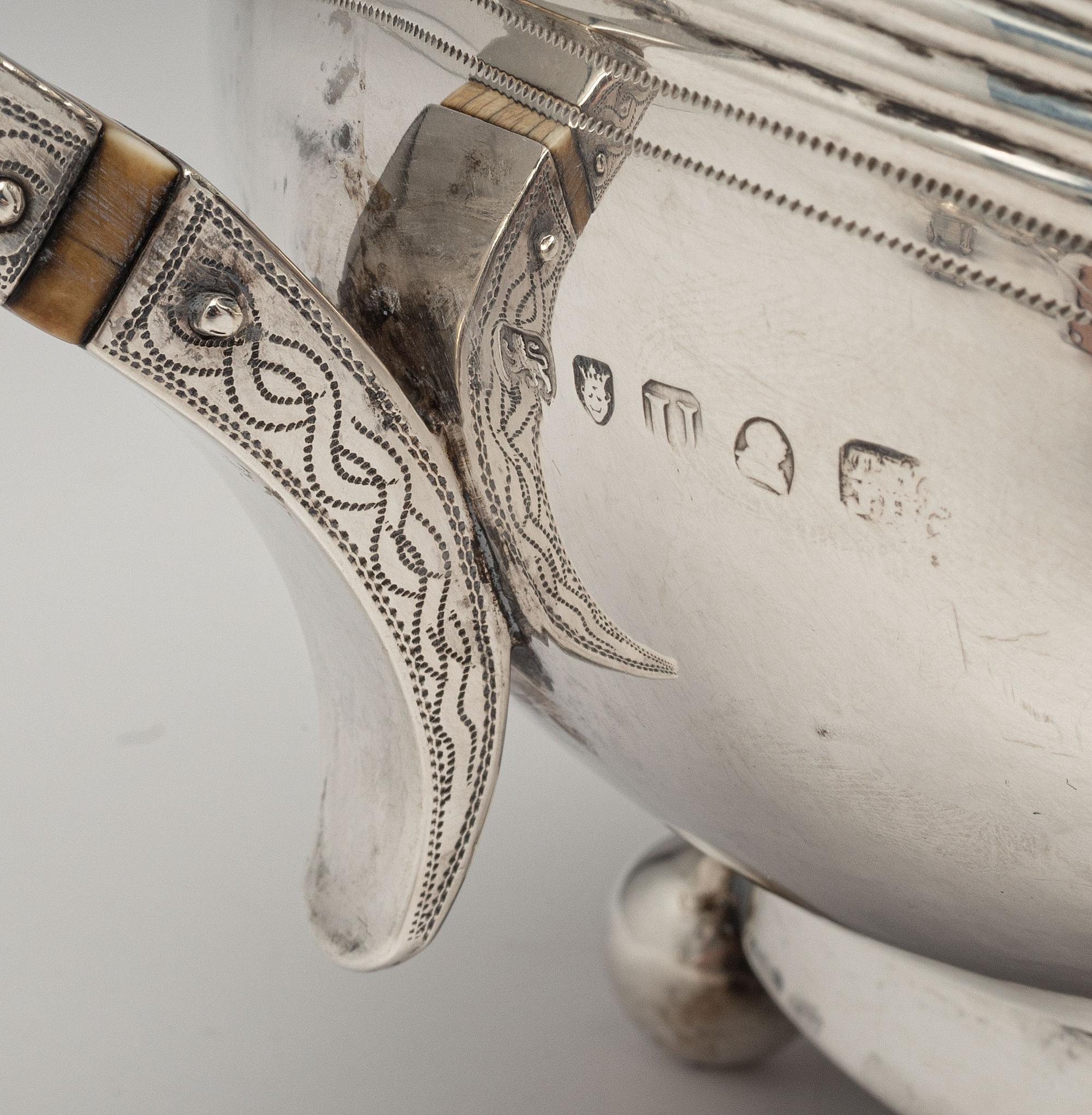 An English Silver Four-Piece Coffee and Tea Service