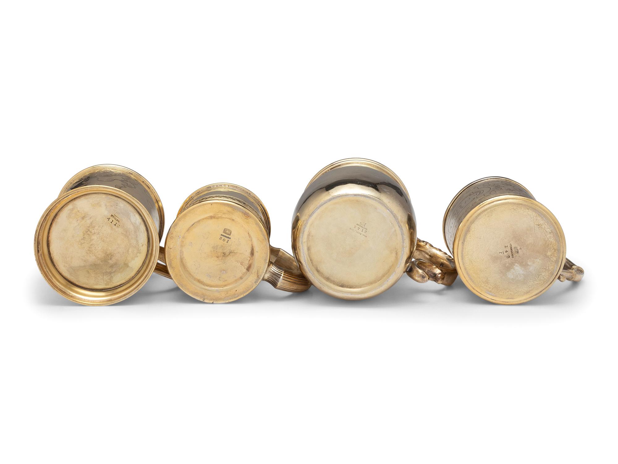 Four American Silver-Gilt Mugs