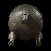 A large Chinese patinated bronze archaistic tripod censer, Ding, and wood cover, The Bronze 17th/18th Century or Earlier 清 青銅鼎式爐