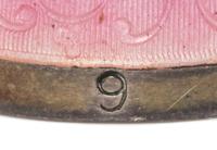 An American Silver and Guilloche Enamel Thimble, Simons Bros., Philadelphia, PA, the knurled top and body above a pink guilloche enamel