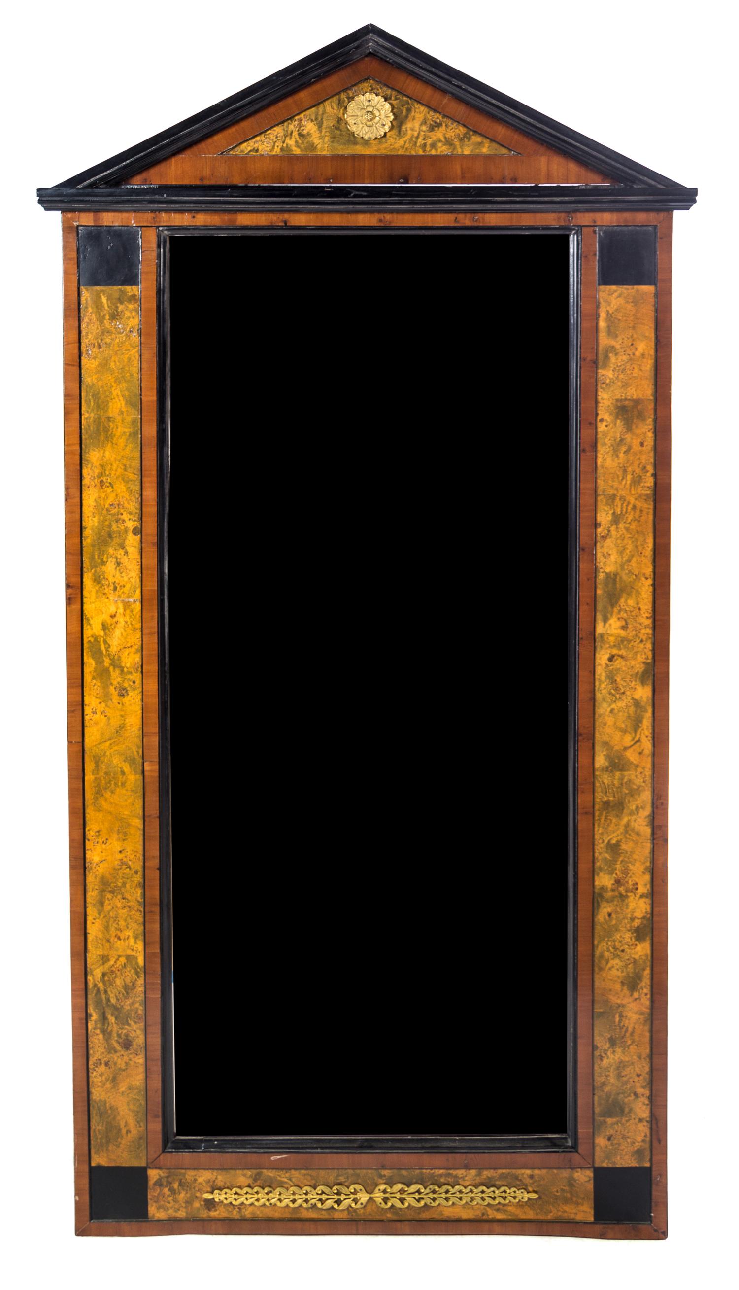 A Biedermeier Parcel Ebonized Fruitwood and Burlwood Pier Mirror Height 74 1/2 x width 36 3/4 inches. — EARLY 19TH CENTURY