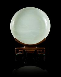 A Pale Celadon Jade Circular Dish Diameter 5 1/8 inches.