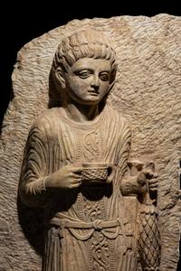 A Palmyrene Limestone Relief Fragment of a Youth