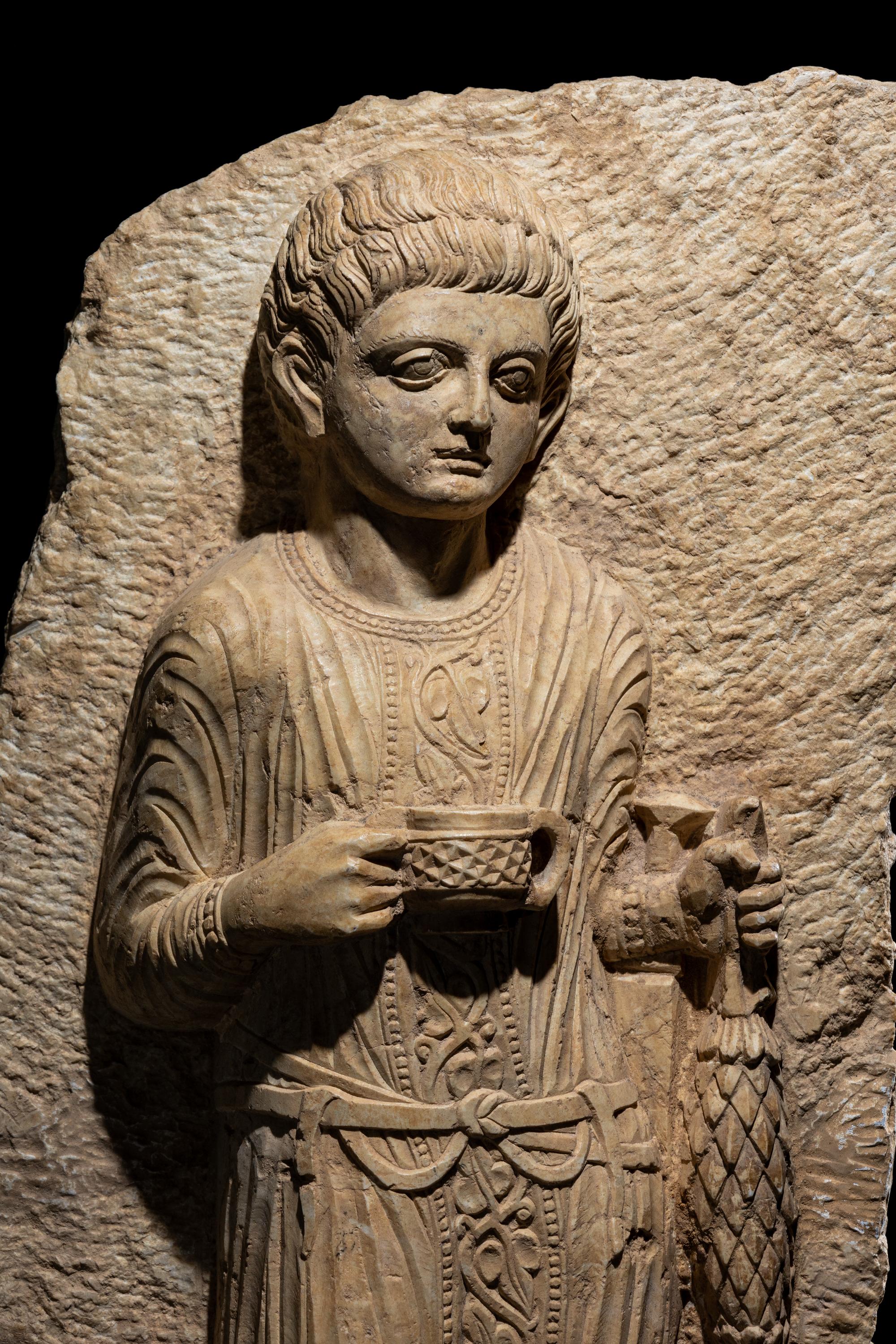 A Palmyrene Limestone Relief Fragment of a Youth