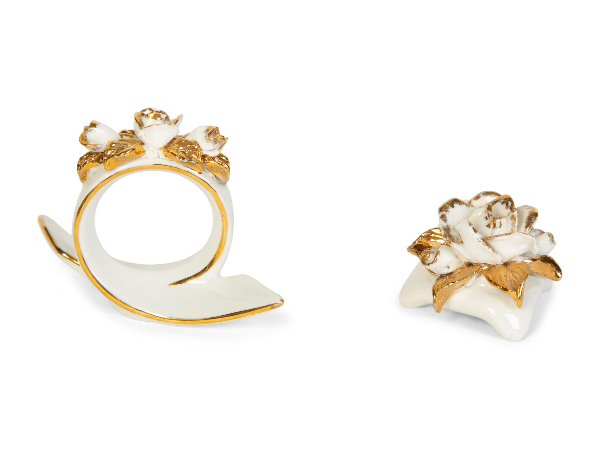 A Large Collection of Napkin Rings, Place Card Holders, and Utensil Rests
