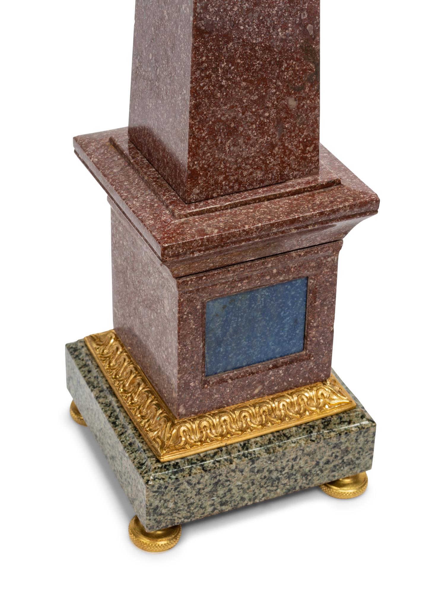 A Pair of Grand Tour Style Gilt Bronze Mounted Tri-Color Granite and Lapis Lazuli Obelisks