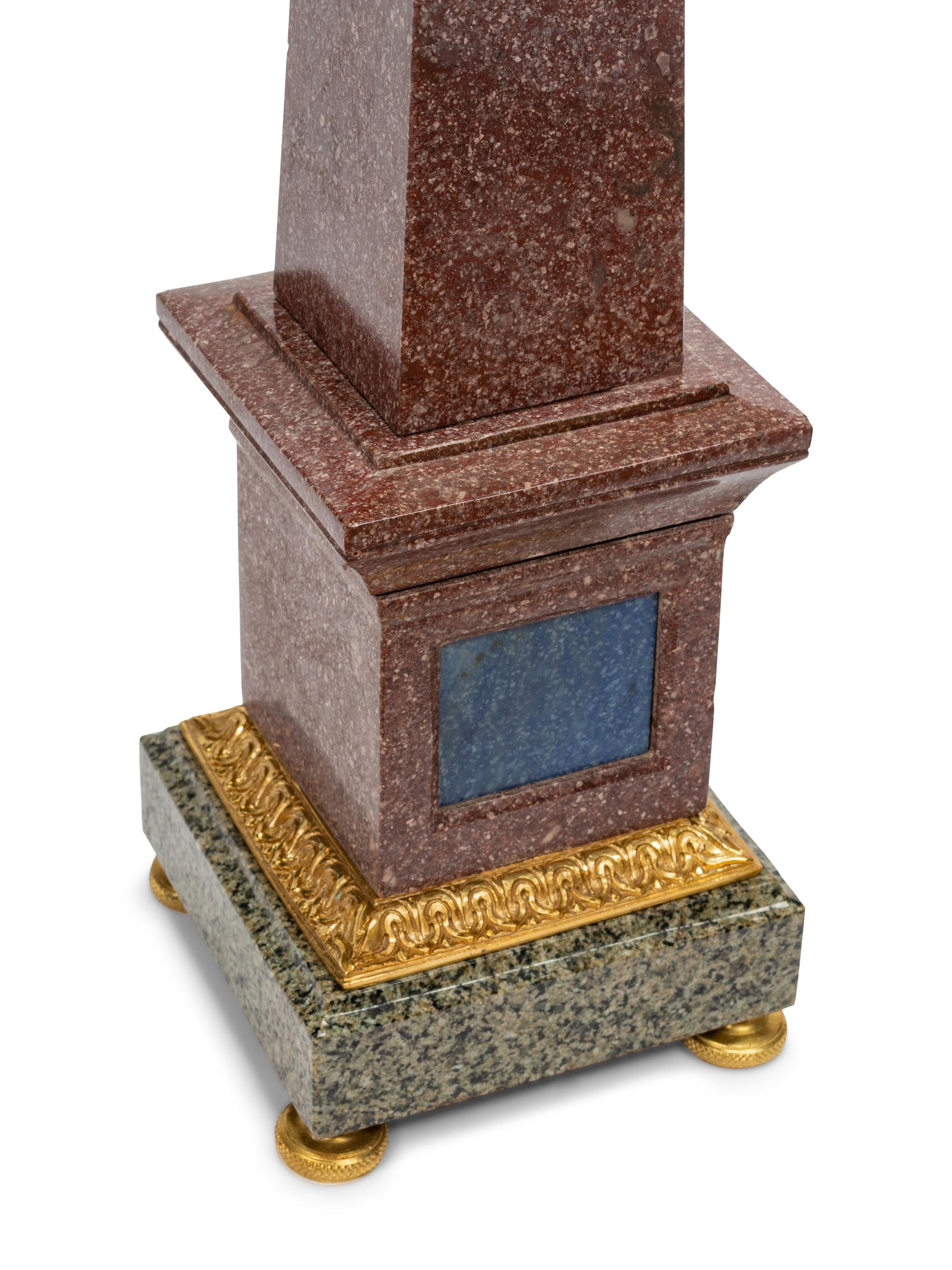 A Pair of Grand Tour Style Gilt Bronze Mounted Tri-Color Granite and Lapis Lazuli Obelisks