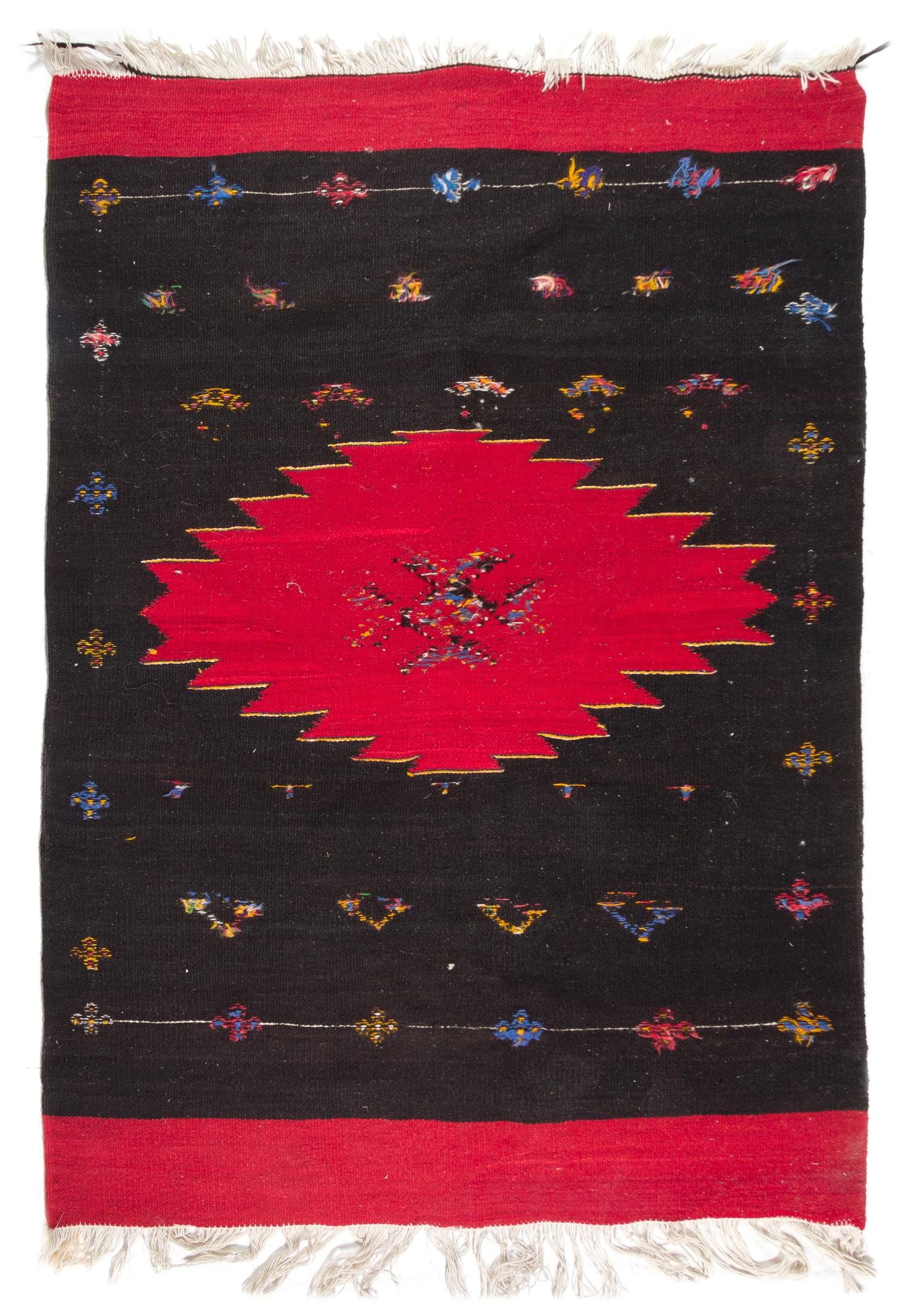 A Moroccan Flatweave Rug 5 feet 1 inch x 3 feet 7 inches. — 20TH CENTURY