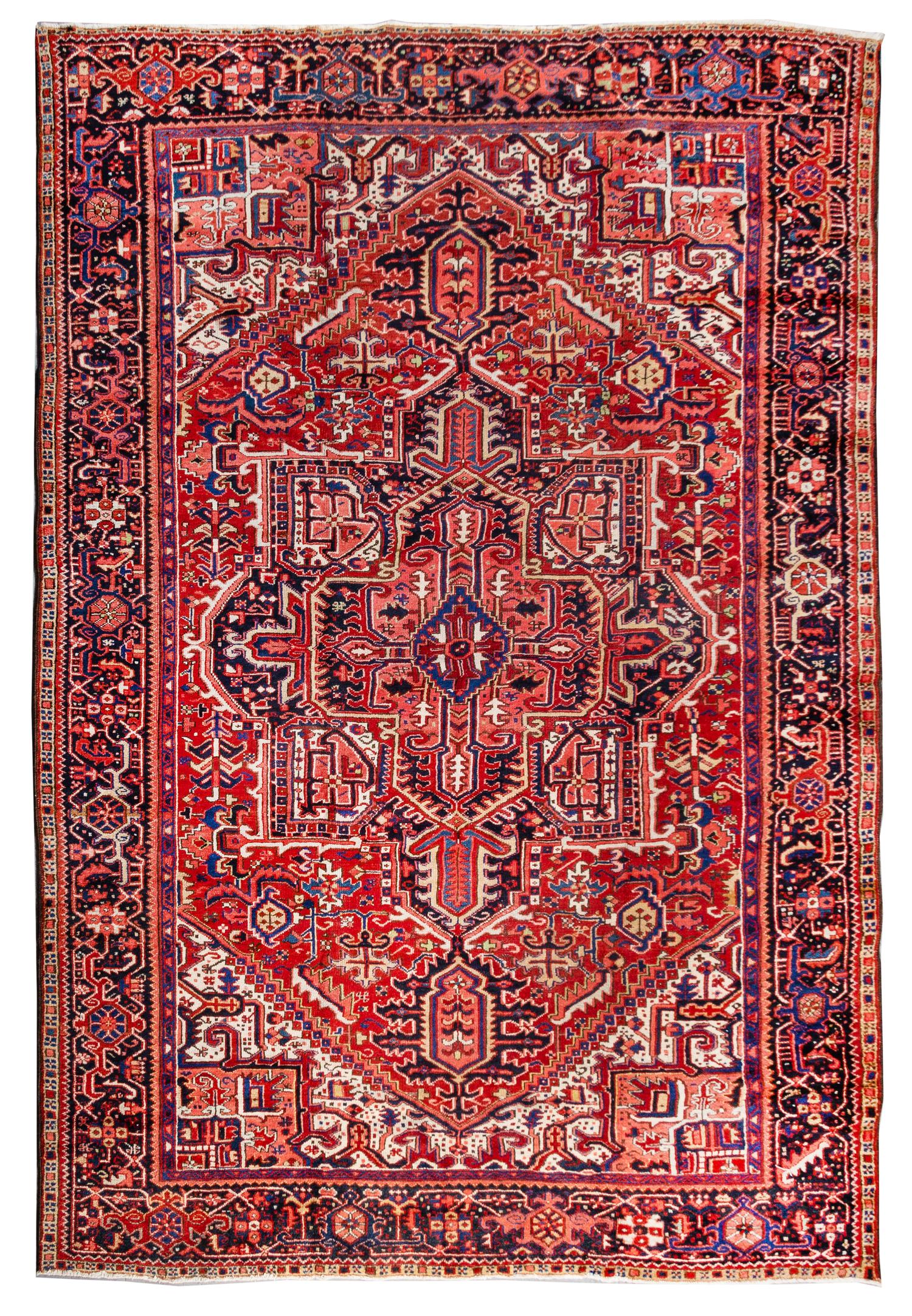A Heriz Wool Rug 11 feet 5 1/2 inches x 8 feet 2 inches. — FIRST HALF 20TH CENTURY